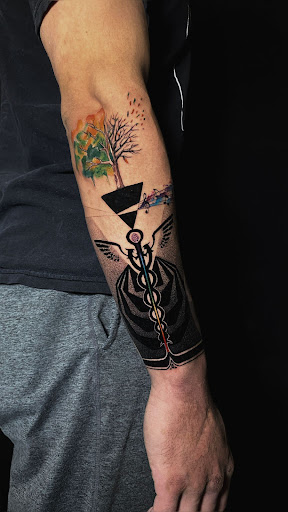 Explore ripped tattoo ideas, creative tattoo ideas in Miami, available at Miami Tattoo & Co Midtown