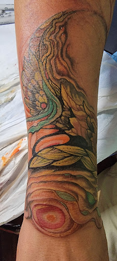 Find bubble tattoo ideas for your next unique tattoo in Lander at Blackblood Tattoo and Piercing