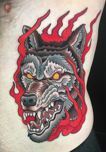 Explore pretty flower tattoo ideas, creative tattoo ideas in Swannanoa, available at Iron Wolves Tattoo