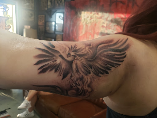 Explore cool cover up tattoo ideas, creative tattoo ideas in Lakeland, available at Holy Grail Tattoo