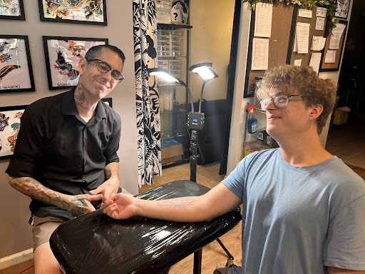 Explore tulip tattoo ideas, creative tattoo ideas in Honolulu, available at Aloha Tattoo Waikiki Hilton Hawaiian Village Rainbow Bazaar