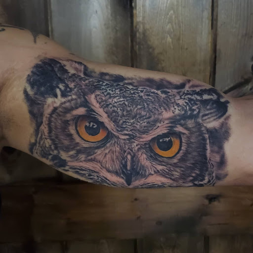 Explore lisa frank tattoo ideas, creative tattoo ideas in Green Bay, available at The Blue Gem Tattooing