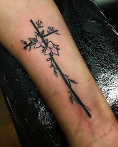Explore medium tattoo ideas for females, creative tattoo ideas in Cumberland, available at Queen City Ink