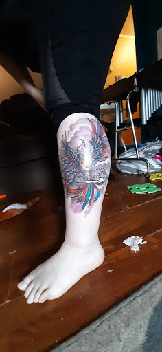 Explore flag tattoo ideas, creative tattoo ideas in Erie, available at Ronin Ink