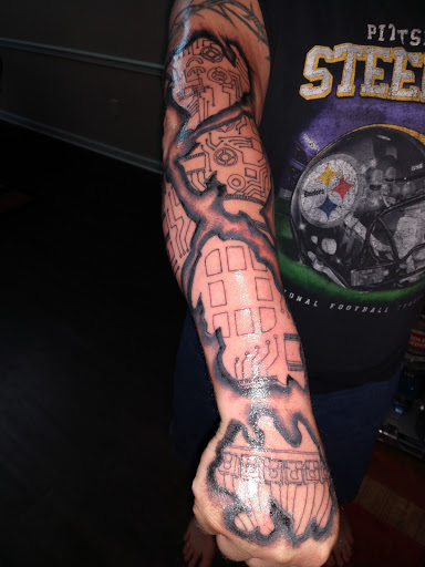 Explore tattoo arm filler ideas, creative tattoo ideas in Bethesda, available at Bethesda Tattoo