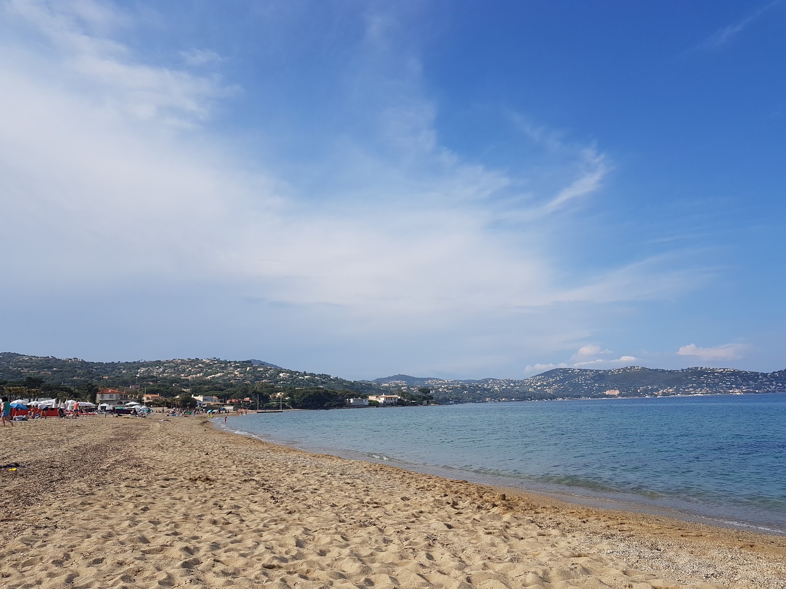 Foto von Nartelle Strand und die siedlung