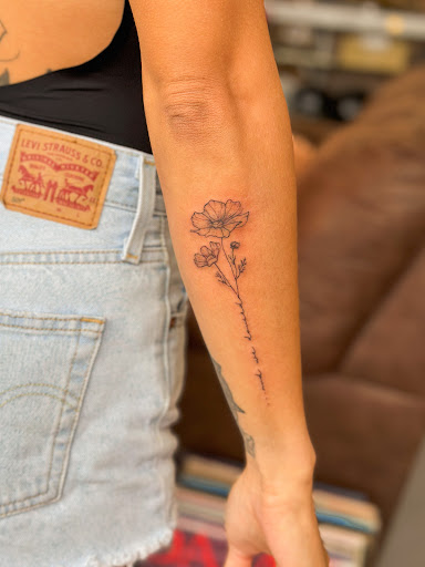 Explore postage stamp tattoo ideas, creative tattoo ideas in Kailua Kona, available at Mehana Tattoo