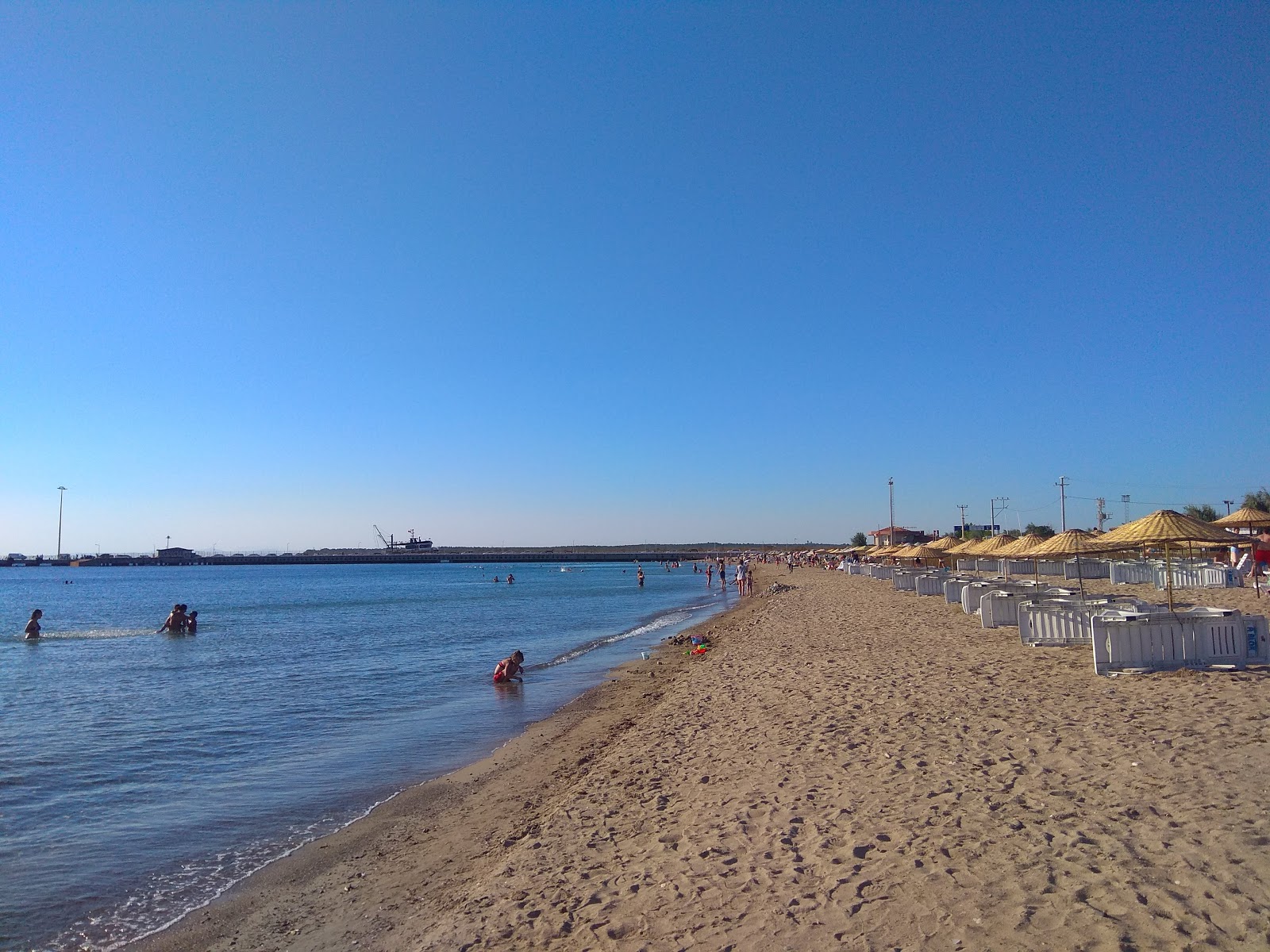 Fotografija Plaža Geyikli z svetel pesek površino