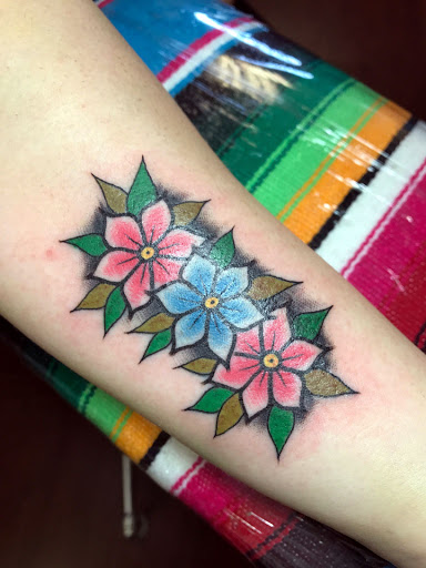 Explore santa tattoo ideas, creative tattoo ideas in Modesto, available at Inkwell Tattoo