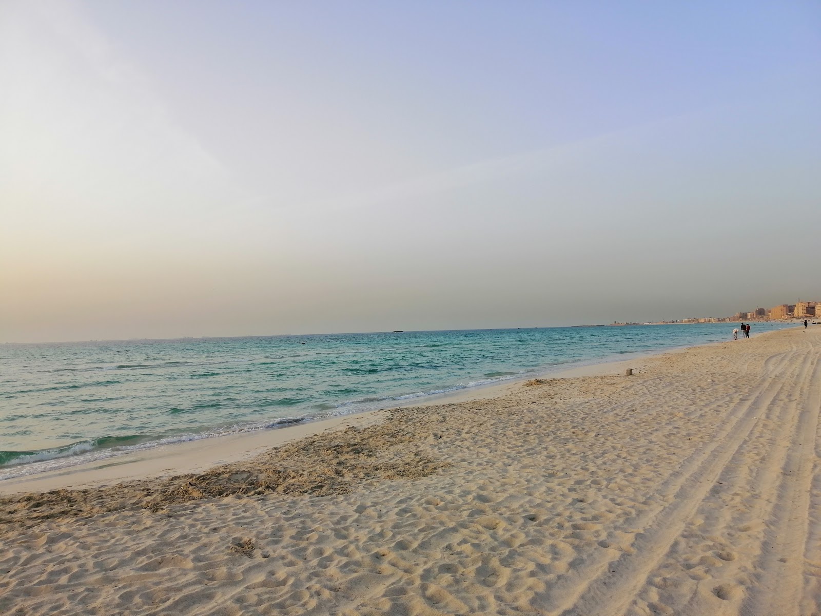 Foto von Aziz Market Beach mit feiner weißer sand Oberfläche