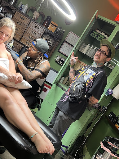 Explore lady thigh tattoo ideas, creative tattoo ideas in Savannah, available at Tramp Art Studios