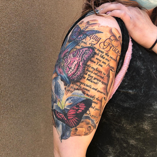 Explore blue rose tattoo ideas, creative tattoo ideas in Cape Girardeau, available at Estes Tattoo Collective