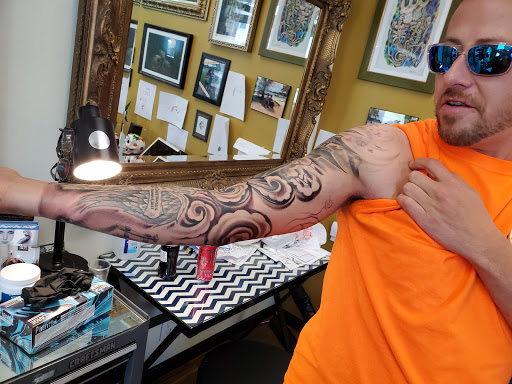Explore knee scar tattoo ideas, creative tattoo ideas in Rock Island, available at OTool Design Custom Tattoo