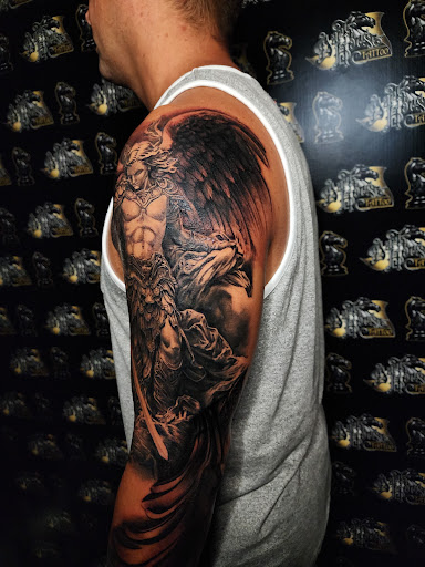 Explore awesome sleeve tattoo ideas for guys, creative tattoo ideas in Warren, available at Dark Horse Tattoo Co. LLC.