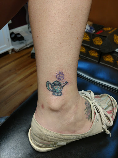 Explore eagle feather tattoo ideas, creative tattoo ideas in Asheboro, available at Wonderland Tattoo