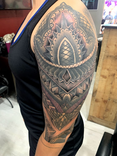 Explore tattoo ideas guns, creative tattoo ideas in Cape Coral, available at UNRIVALED INK