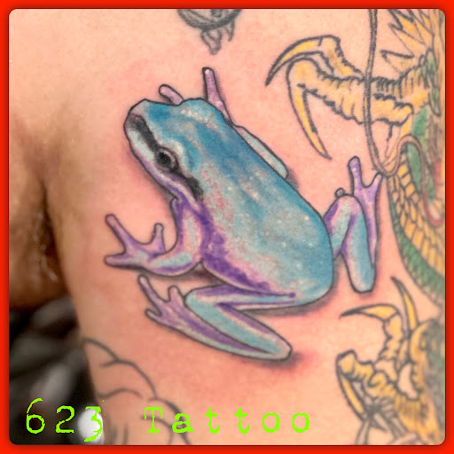 Explore red ink tattoo ideas for guys, creative tattoo ideas in Watertown, available at 623 Tattoo