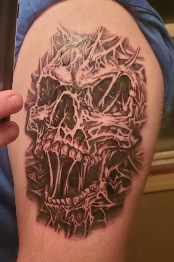 Explore chaos tattoo ideas, creative tattoo ideas in Mitchell, available at Anchor and the Ark Tattoo Studio, LLC