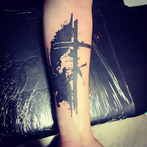 Explore rip tattoo ideas, creative tattoo ideas in Columbus, available at Broken Tarot Tattoo Parlour