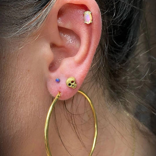 Explore ampersand tattoo ideas, creative tattoo ideas in Ambler, available at Tattoo GalaxyAmbler Piercing & Custom Tattoos