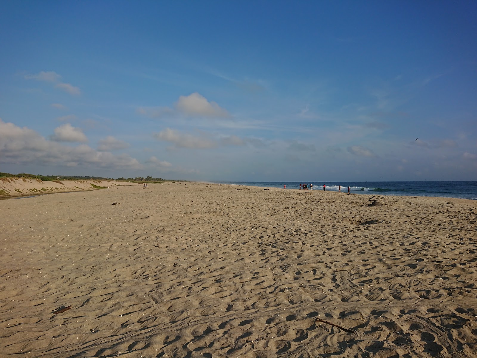 Valokuva Playa Escobillaista. pinnalla hienoa beige-hiekkaa:n kanssa