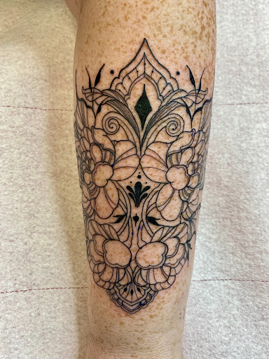 Explore star sleeve tattoo ideas, creative tattoo ideas in Lake City, available at Crooked Spines Tattoo Studio