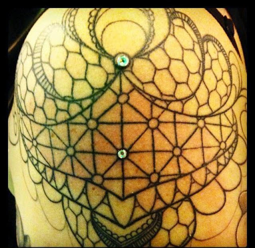 Explore cleavage tattoo ideas, creative tattoo ideas in Houston, available at Biolab Fine Jewelry and Body Piercing Studio