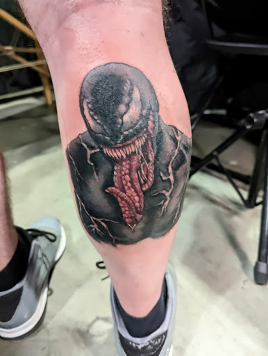 Explore cool cross tattoo ideas, creative tattoo ideas in New Hartford, available at Bodily Charm Tattoo & Piercing