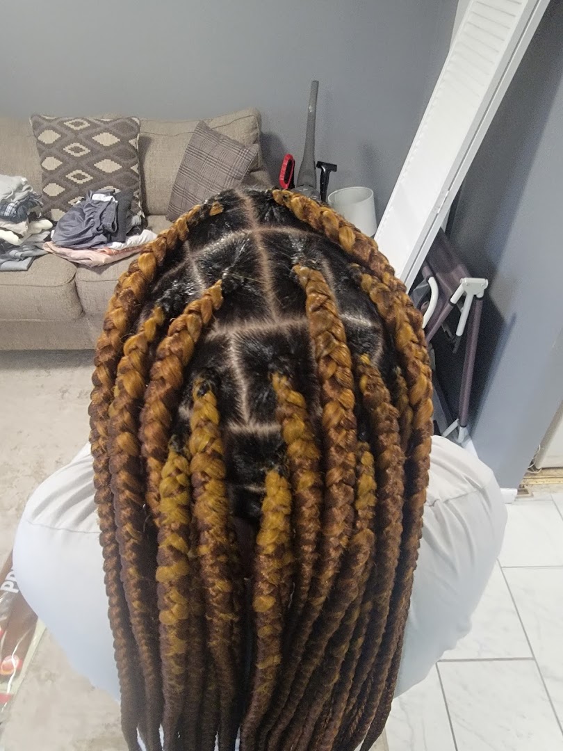Musa Hair braiding