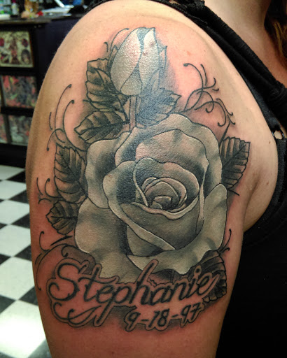 Explore women's hip tattoo ideas, creative tattoo ideas in Fayetteville, available at Chop Shop Tattoo