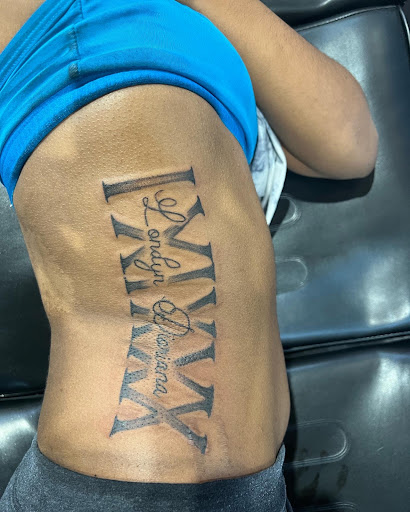 Explore tattoo ideas for breast cancer ribbon, creative tattoo ideas in Lexington, available at LexInk Tattoo