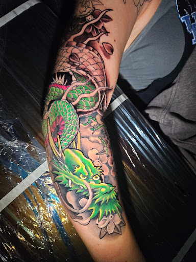 Explore tattoo on buttock ideas, creative tattoo ideas in Angola, available at Hoodlum Ink