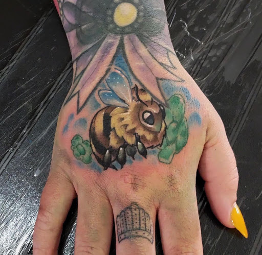 Explore small red tattoos ideas, creative tattoo ideas in Clinton, available at Black Relic Tattoo