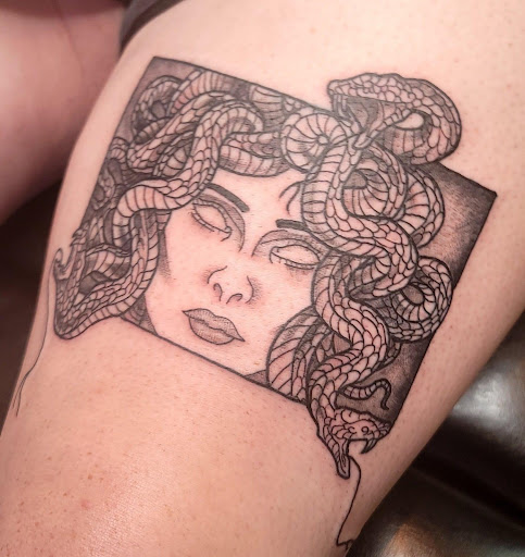 Explore joy tattoo ideas, creative tattoo ideas in Chattanooga, available at The Sailors Den Tattoos and Piercing & The Scurvy Pearl Music Venue