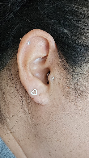 Explore woman face tattoo ideas, creative tattoo ideas in Dana Point, available at Get My Point