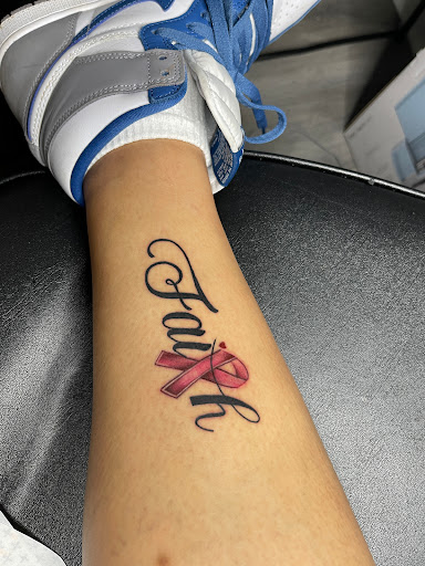 Explore mens bicep tattoo ideas, creative tattoo ideas in Madison, available at Elevation Ink Tattoo Studio