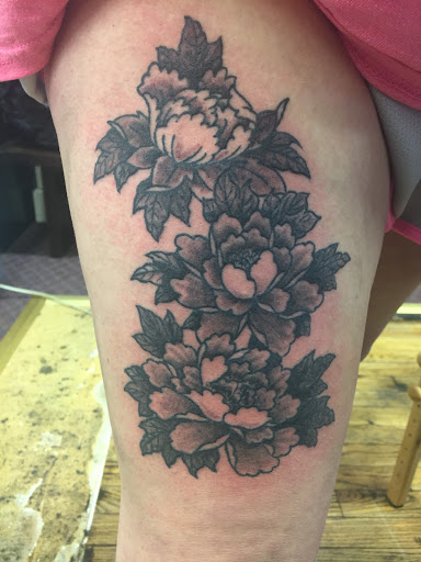 Explore small car tattoo ideas, creative tattoo ideas in Eureka Springs, available at Sailors Luck Tattoo