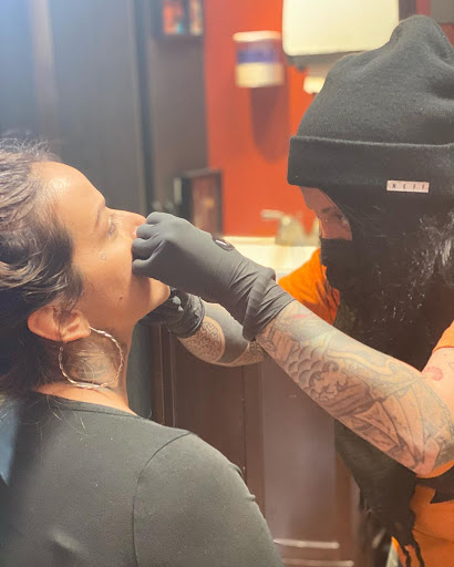 Explore sad tattoo ideas for guys, creative tattoo ideas in Kissimmee, available at Ol Skool Tattoos Studio