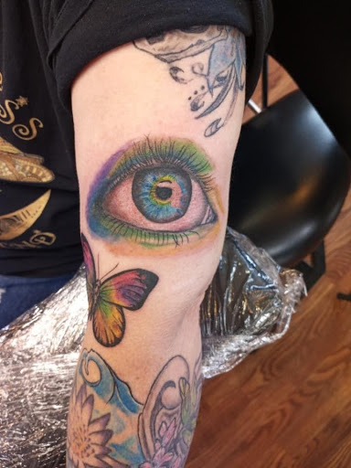 Explore hand tattoo ideas for men, creative tattoo ideas in Butler, available at Kryptic Skin Tattoo