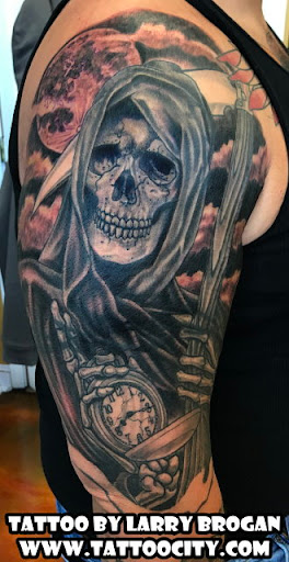 Explore female elbow tattoo ideas, creative tattoo ideas in Lockport, available at Tattoo City by Larry Brogan