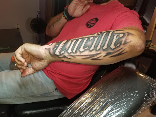 Find surrealism tattoo ideas for your next unique tattoo in Shelby at T&C Tattoo Studios