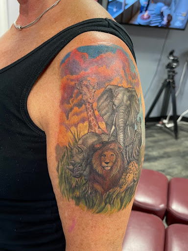 Find boob tattoo idea for your next unique tattoo in Des Moines at Skin Kitchen Tattoo