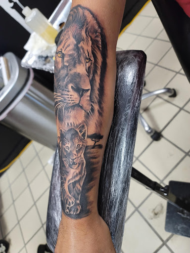 Explore shoe tattoo ideas, creative tattoo ideas in Hereford, available at Slow Pain Tattoo Body Art Studio