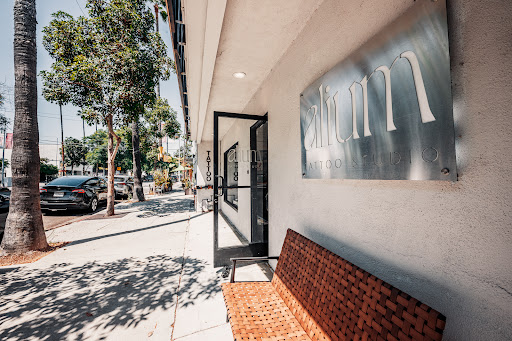 Find dino tattoo ideas for your next unique tattoo in Culver City at Alium Tattoo Studio