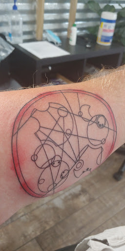 Explore birth month flower tattoo ideas, creative tattoo ideas in Lakeland, available at Black Swan Tattoo