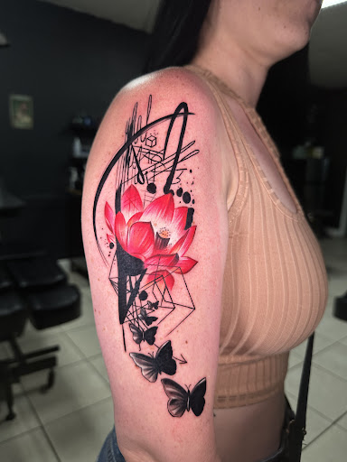 Explore ankle flower tattoo ideas, creative tattoo ideas in Tampa, available at Legacy ink tattoos
