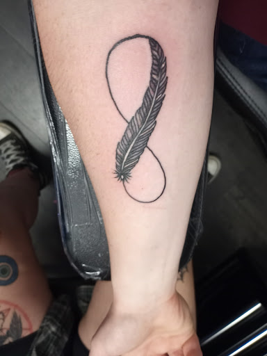 Explore female arm sleeve tattoo ideas, creative tattoo ideas in Pigeon Forge, available at Black Orchid Tattoo Studio