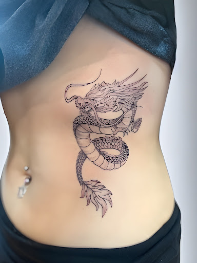 Explore aztec sleeve tattoo ideas, creative tattoo ideas in Huntington, available at Timeless Tattoo Gallery