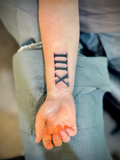 Explore side tattoo ideas for females, creative tattoo ideas in Charlotte, available at Olive Branch Tattoo Studio