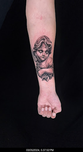 Explore little hand tattoo ideas, creative tattoo ideas in Chicago, available at Master Craft Tattoo Co.